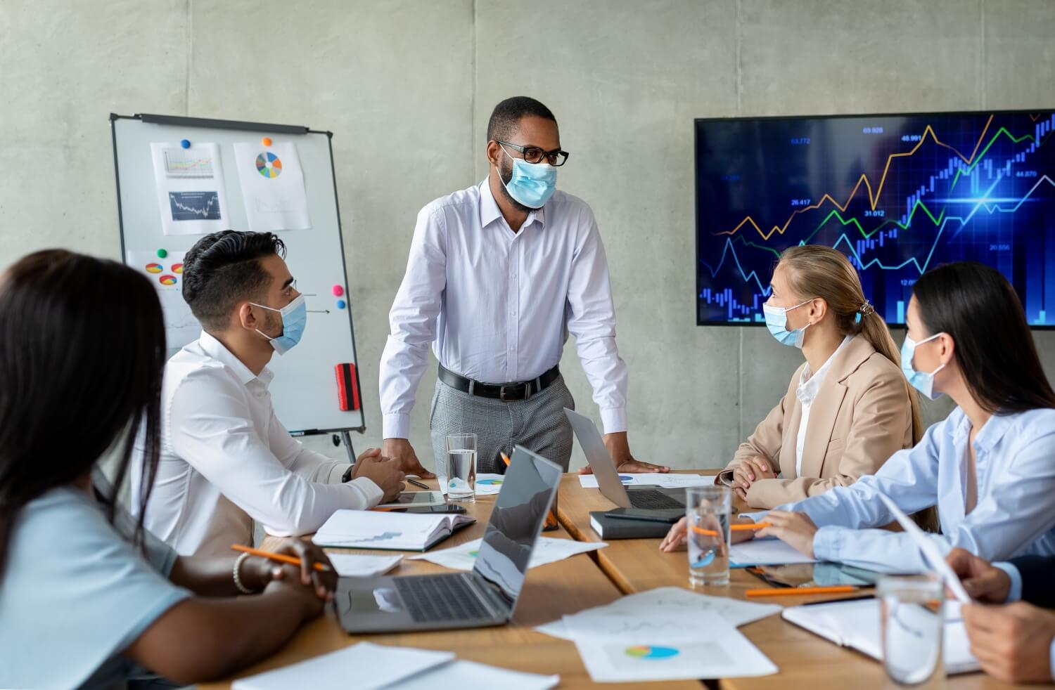 corporate-meeting-black-boss-wearing-face-mask-ha-2023-11-27-05-31-35-utc Insurance IT